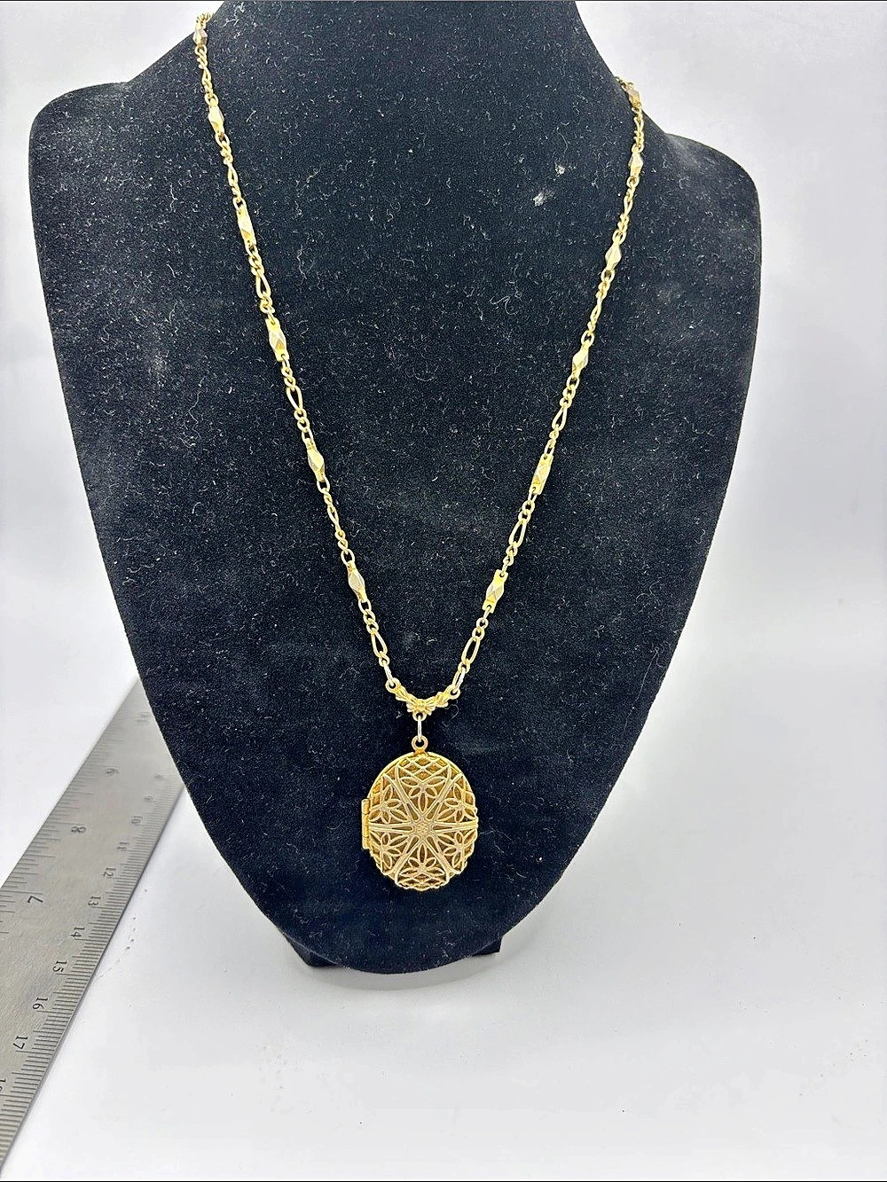 1928 Jewelry Gold Tone Oval Filigree Flower Locket Necklace